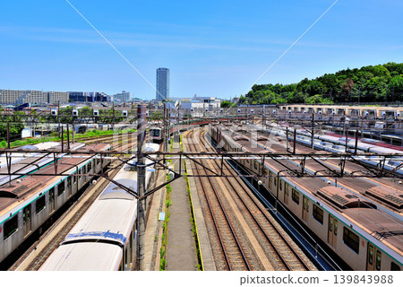 View of the Tokyu Corporation's Nagatsuta train depot from an overpass on the Tokyu Den-en-toshi Line. View of the Tokyu Corporation's Nagatsuta train depot from an overpass on the Tokyu Den-en-toshi Line. 139843988