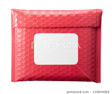 A thin parcel wrapped in a bag with air cushioning. 139844068