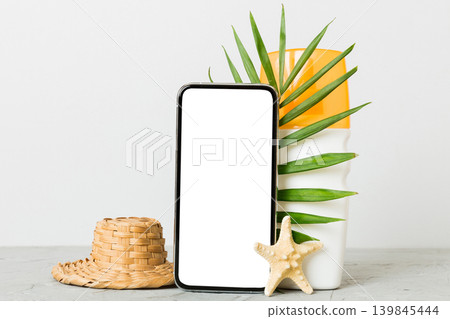 Smartphone mock up template with summer objects. Perspective view with copy space for text 139845444