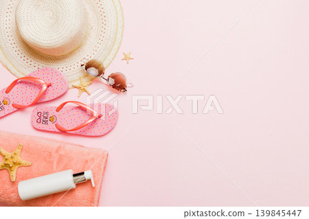 Top view travel or vacation concept. Composition with stylish beach accessories on colored background, top view. Beach fashion flat lay, summer concept. Trendy colors Top view travel or vacation concept. Composition with stylish beach accessories on colored background, top view. Beach fashion flat lay, summer concept. Trendy colors 139845447