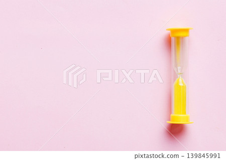 hourglass on the table, sand clock as time passing concept for business deadline, copy space 139845991