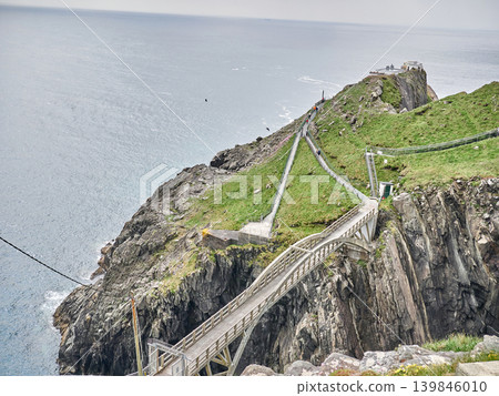Cliffside walkway to remote island lookout Cliffside walkway to remote island lookout 139846010