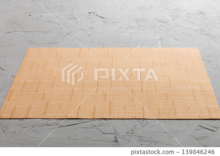 Perspective view of brown tablecloth for food on cement background. Empty space for your design Perspective view of brown tablecloth for food on cement background. Empty space for your design 139846246