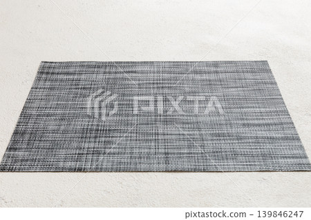 Perspective view of grey tablecloth for food on cement background. Empty space for your design Perspective view of grey tablecloth for food on cement background. Empty space for your design 139846247