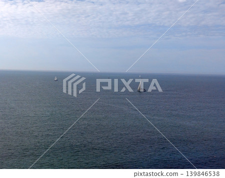 Sailing boats in the open sea background Sailing boats in the open sea background 139846538