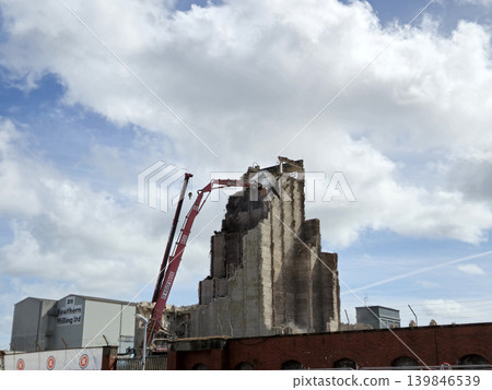 Process of Ruining the Building's Facade in the Industrial Area 139846539