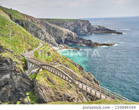 Coastal cliff path above turquoise sea Coastal cliff path above turquoise sea 139846549