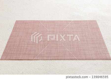 Perspective view of red tablecloth for food on cement background. Empty space for your design 139846595