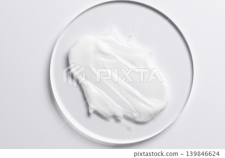 A sample of a cosmetic product. A moisturizing gel or shaving cream or body milk. A sample of a cosmetic product. A moisturizing gel or shaving cream or body milk. 139846624