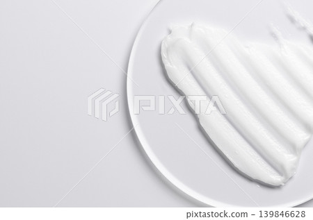 A sample of a cosmetic product. A moisturizing gel or shaving cream or body milk. Copy space A sample of a cosmetic product. A moisturizing gel or shaving cream or body milk. Copy space 139846628