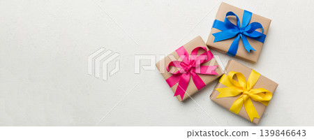 Collection of Holiday present boxes on a colored background. top view close up 139846643