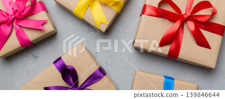 Collection of Holiday present boxes on a colored background. top view close up Collection of Holiday present boxes on a colored background. top view close up 139846644