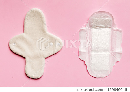 set of colorful bright reusable menstrual pads. zero waste woman periods concept top view with copy space set of colorful bright reusable menstrual pads. zero waste woman periods concept top view with copy space 139846646