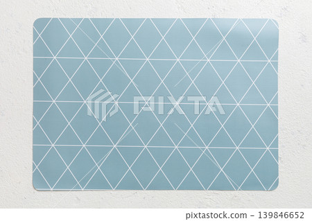 Top view of grey tablecloth for food on cement background. Empty space for your design Top view of grey tablecloth for food on cement background. Empty space for your design 139846652
