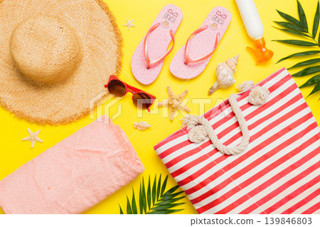 Composition with stylish beach accessories on colored background, top view. Beach fashion flat lay, summer concept. Trendy colors Composition with stylish beach accessories on colored background, top view. Beach fashion flat lay, summer concept. Trendy colors 139846803