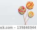 Set of colorful lollipops on colored background. Summer concept. Party Happy Birthday or Minimalist Concept 139846944