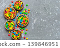 different colored round candy in bowl and jars. Top view of large variety sweets and candies with copy space 139846951