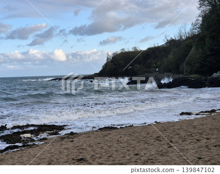 Empty Ocean Beach With Stormy Waves Background Empty Ocean Beach With Stormy Waves Background 139847102
