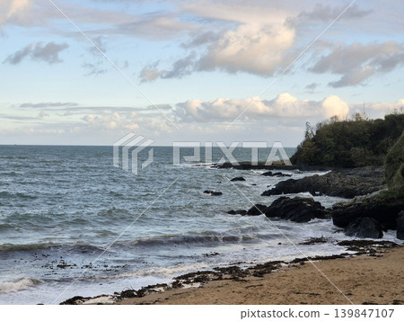 Empty Ocean Beach With Stormy Waves Background Empty Ocean Beach With Stormy Waves Background 139847107