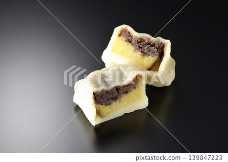 Ikinari Dango photographed against a black background Ikinari Dango photographed against a black background 139847223