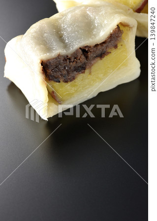 Ikinari Dango photographed against a black background Ikinari Dango photographed against a black background 139847240