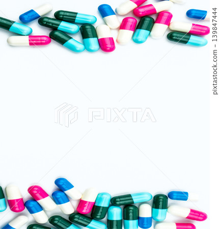 Antibiotic capsules pills healthcare concept. Drug resistance awareness and responsible medication use for infection treatment and policy. Rational drug use in healthcare system policy and insurance. Antibiotic capsules pills healthcare concept. Drug resistance awareness and responsible medication use for infection treatment and policy. Rational drug use in healthcare system policy and insurance. 139847444