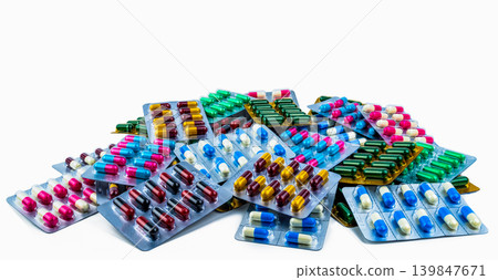 Colorful of antibiotic capsule pills isolated in blister pack isolated on white background with copy space. Antibiotic drug resistance. Pharmaceutical industry. Antimicrobial resistance concept. 139847671