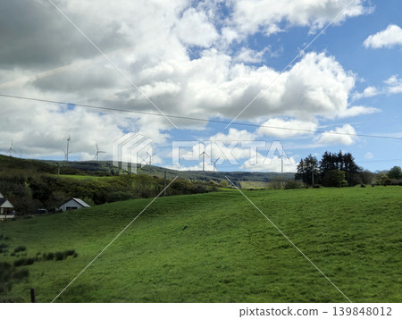 Beautiful Green Valley And Fields Of Ireland Under Deep Blue Summer Sky Natural Background Beautiful Green Valley And Fields Of Ireland Under Deep Blue Summer Sky Natural Background 139848012