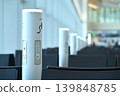 Waiting room chairs and charging outlet pole 139848785