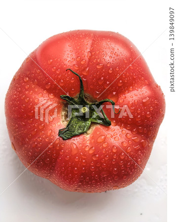 Single Ripe Tomato On White Background Single Ripe Tomato On White Background 139849097