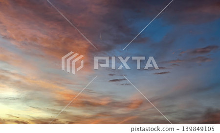Dramatic Sunset Clouds Blending Across Evening Sky Dramatic Sunset Clouds Blending Across Evening Sky 139849105
