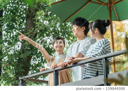 A group of men and women refreshing themselves in nature during holidays and summer vacation. 139849300