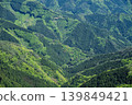 A beautiful mountain range enveloped in vibrant new greenery, photographed from the Shikoku Karst. 139849421