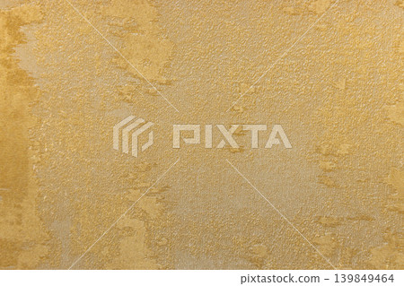 Gold textured wallpaper background with elegant plaster pattern Gold textured wallpaper background with elegant plaster pattern 139849464