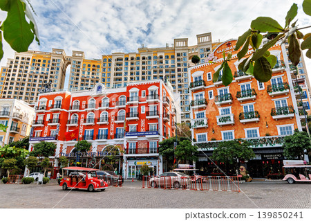 Phu Quoc, Vietnam - January 3 2026: Mediterranean style buildings and street in Phu Quoc Vietnam Phu Quoc, Vietnam - January 3 2026: Mediterranean style buildings and street in Phu Quoc Vietnam 139850241