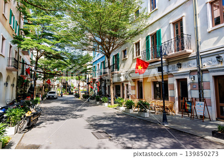 Colorful tourist street with Vietnamese flags in Phu Quoc 139850273