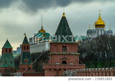 Moscow Kremlin Towers And Golden Cathedral Domes Over City Skyline Under Dramatic Sky Moscow Kremlin Towers And Golden Cathedral Domes Over City Skyline Under Dramatic Sky 139851663