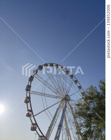Ferris wheel in amusement park Ferris wheel in amusement park 139852006
