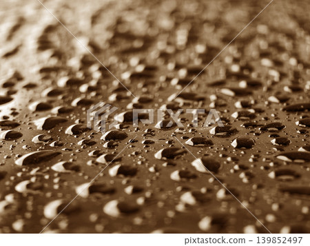 Rain droplets enhance glossy finish of metal after rain Rain droplets enhance glossy finish of metal after rain 139852497