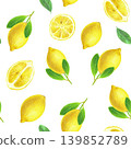 Hand drawn seamless pattern with a yellow lemon with green leaves and a half of a lemon. Yellow lemon on a white background for graphic design.  139852789