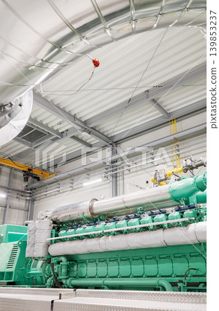 Photo of a gas fired cogeneration engine. Photo of a gas fired cogeneration engine. 139853237