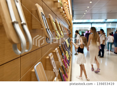 Lively pastel colored phone cases hang systematically displaying diverse textures and styles Lively pastel colored phone cases hang systematically displaying diverse textures and styles 139853419