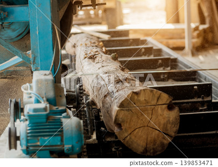 Modern sawmill. Industry sawing boards from logs Modern sawmill. Industry sawing boards from logs 139853471