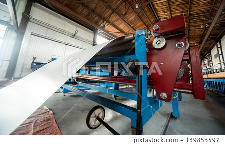 Rolled steel coils in storage areas of metalwork manufacturing. Rolled steel coils in storage areas of metalwork manufacturing. 139853597