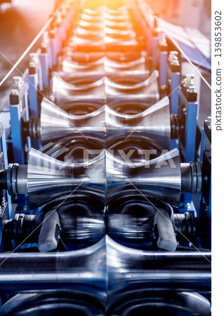 Metal sheet forming machine at the modern metalwork factory. Metal sheet forming machine at the modern metalwork factory. 139853602