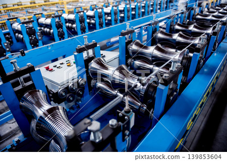 Metal sheet forming machine at the modern metalwork factory. Metal sheet forming machine at the modern metalwork factory. 139853604