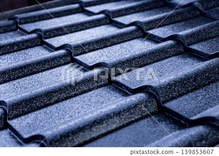 Blue metallic roof tiles background with drops of water. 139853607