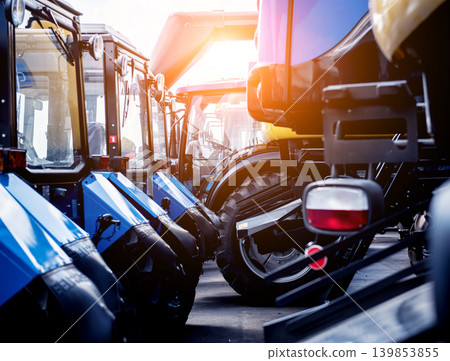 Rows of modern tractors. Industrial details. Agricultural Rows of modern tractors. Industrial details. Agricultural 139853855