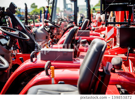 Rows of modern tractors. Industrial details. Agricultural Rows of modern tractors. Industrial details. Agricultural 139853872