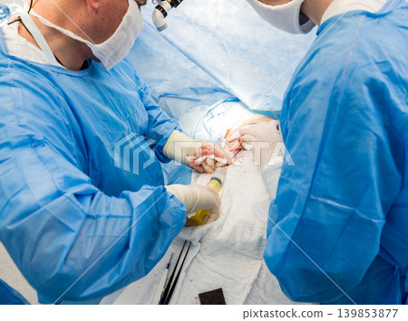 Surgery to remove the breast and replace it with an implant. Surgery to remove the breast and replace it with an implant. 139853877